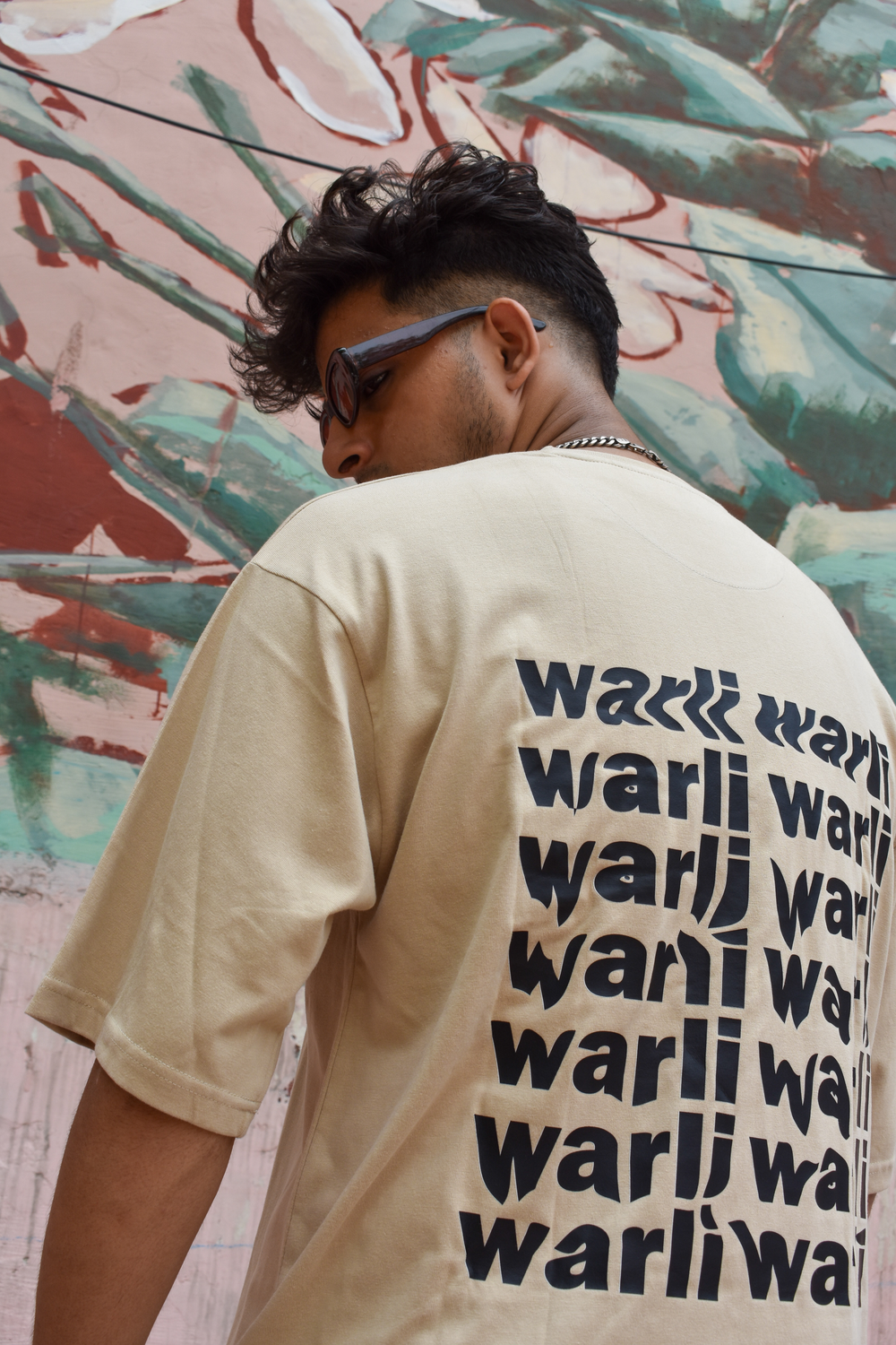 Beige Color Unisex 220 GSM Cotton Oversized T-shirt inspired from the Warli Art of Maharashtra