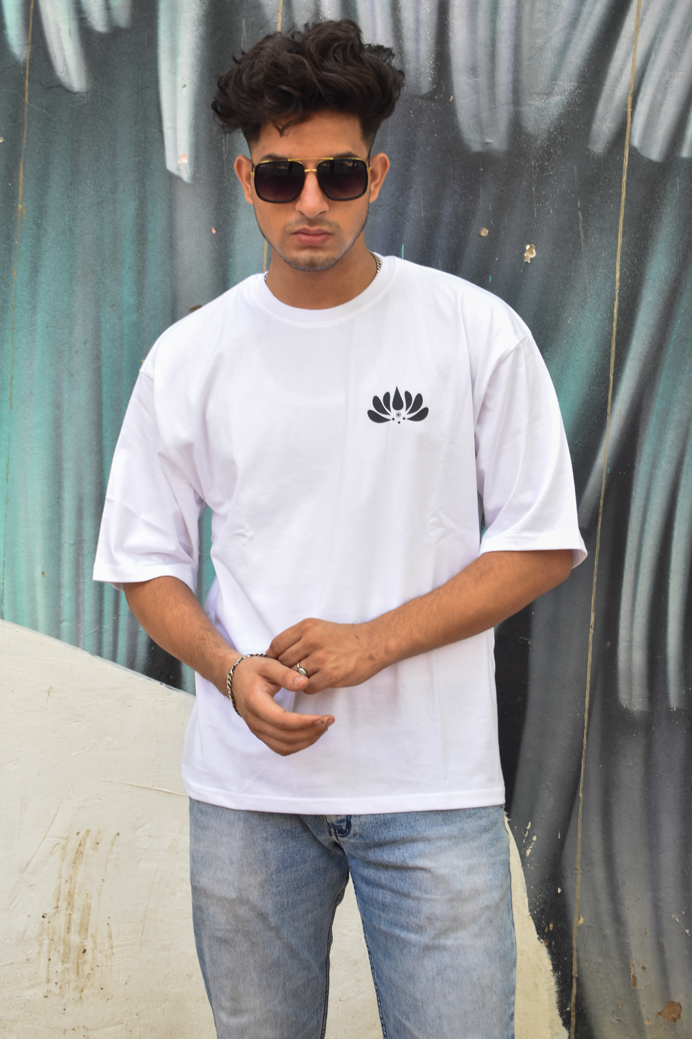 White Color Unisex 220 GSM Oversized cotton T-shirt inspired from the Aipan Art of Uttrakhand